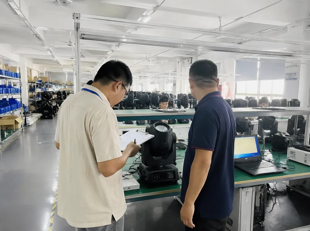 Vefey factory floor during third-party quality audit showing documented workstations and calibration equipment