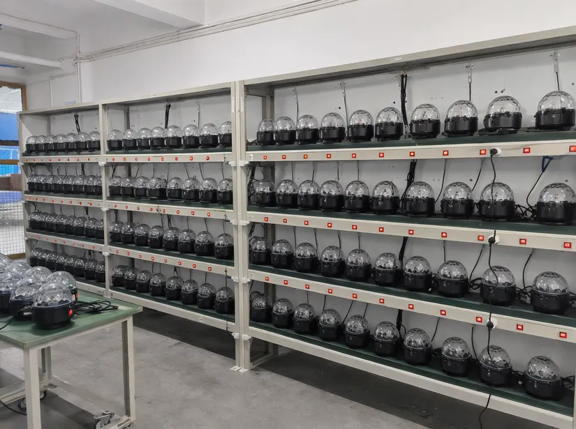 Motor reliability testing bench with disco ball fixture motors undergoing 72-hour run-in at Vefey factory