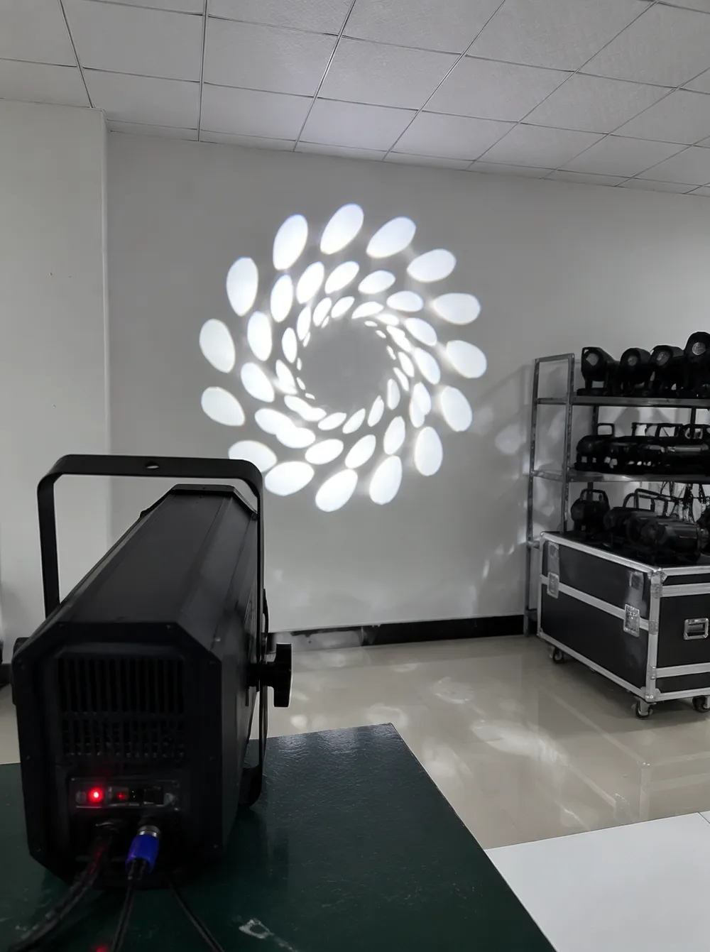 Gobo disco DJ light projecting patterns onto a venue wall — Vefey manufacturing facility output