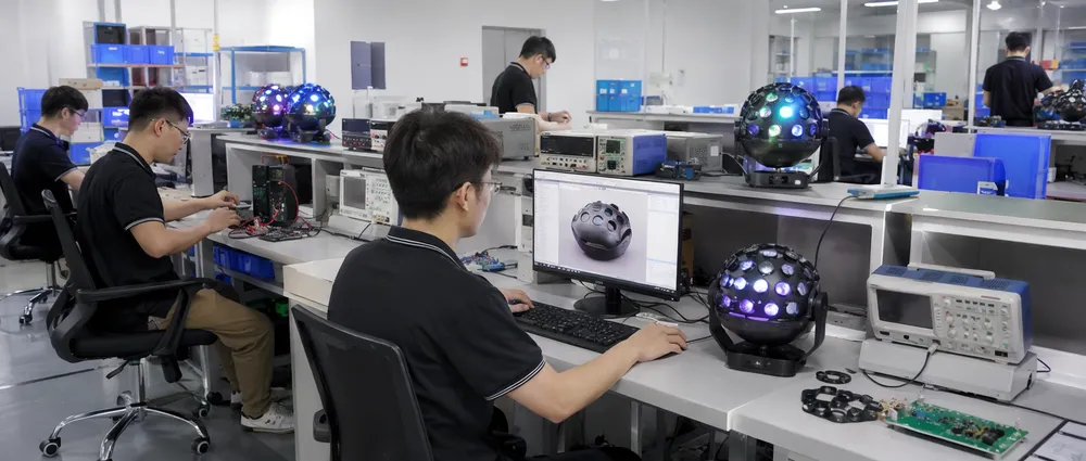 Vefey R&D engineering lab with optical engineers developing custom disco DJ light prototypes for OEM clients