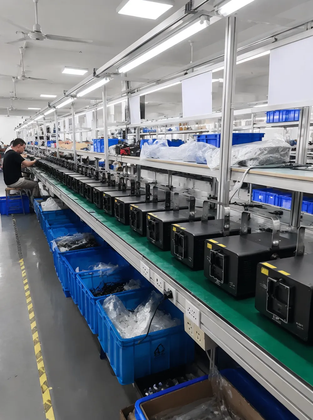 Vefey DJ laser lights manufacturing facility in Guangdong showing assembled units on production line