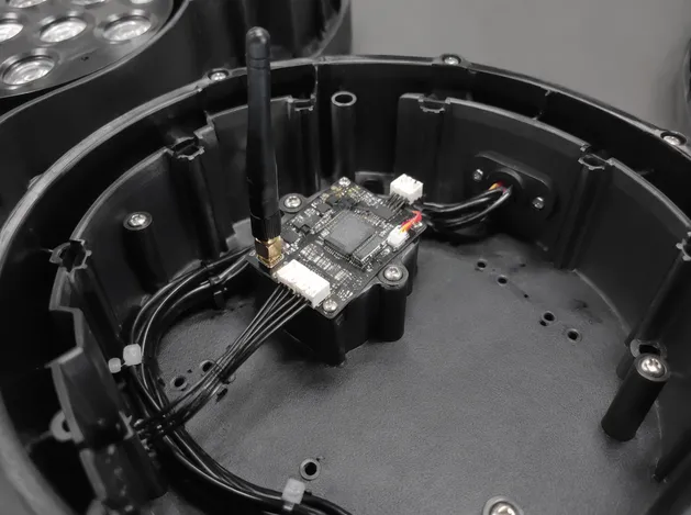 Wireless DMX module factory-installed inside Vefey LED DJ light fixture housing
