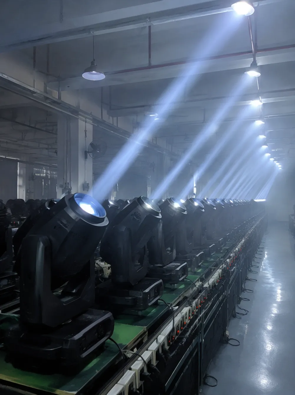 Beam moving head fixture with narrow beam angle creating aerial effects on a dance stage